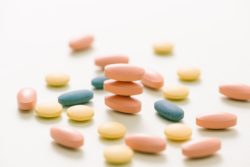 multicolored pills stacked