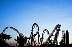 Roller coaster silhouetted at dusk
