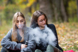 Teen girls vaping