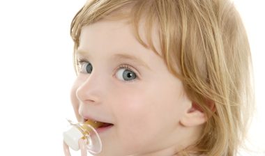 toddler with NUK pacifier
