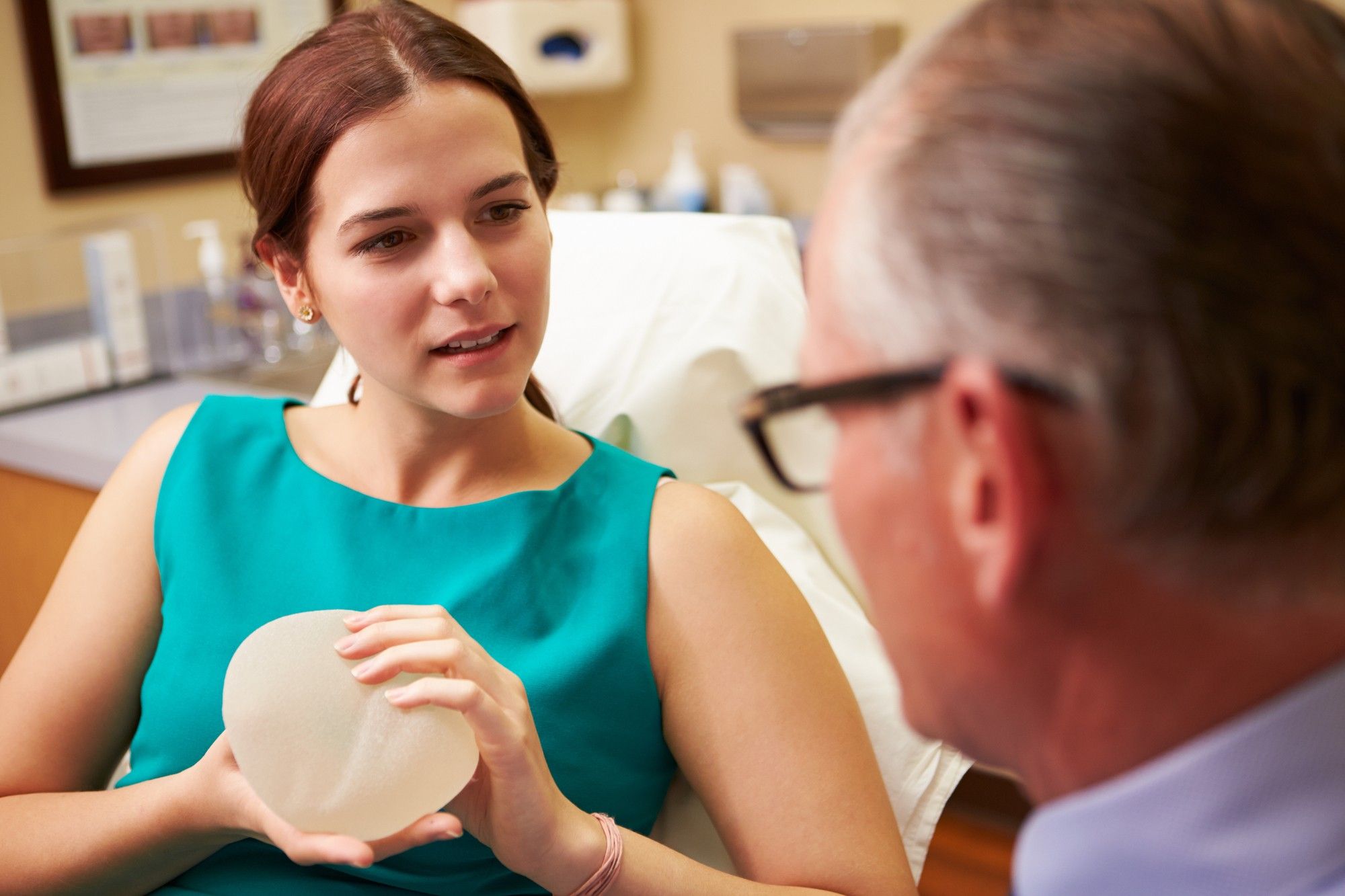 doctor and patient discussing breast implants