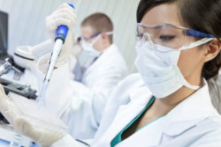 Woman testing in lab