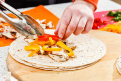 Worker making burrito