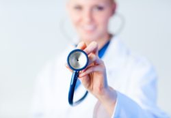 doctor with stethoscope for heart health