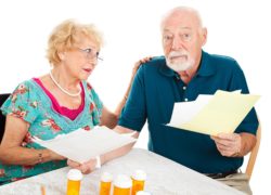 elderly couple dealing with medical bills