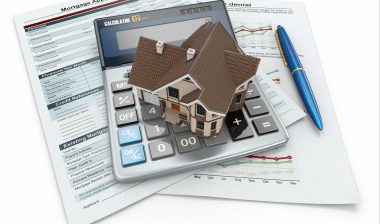 House, calculator, mortgage documents
