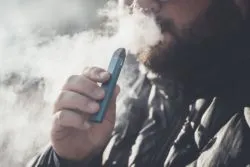 man with vape pen
