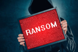 Holding up a ransom sign