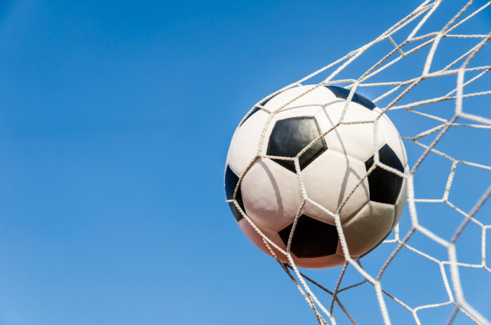 us women's soccer team making goal