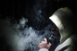 man using vape pen