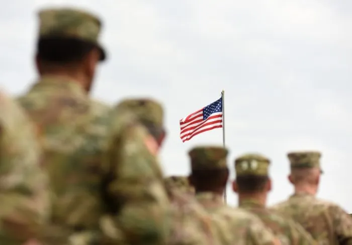 American soldiers with flag