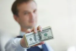 banker collecting funds from bank fees