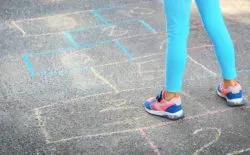 Child playing hopscotch