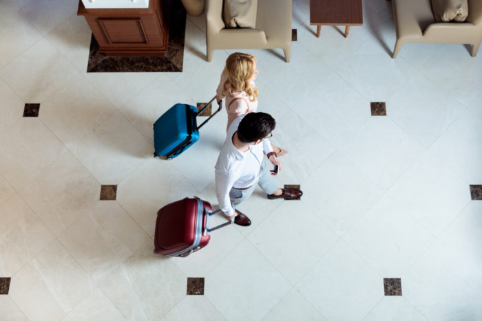couple checking into wyndham hotel