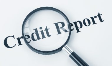 credit report magnifying glass