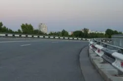 freeway with no cars and visible guardrails