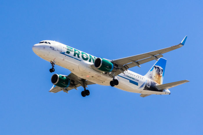 frontier airlines airplane in flight