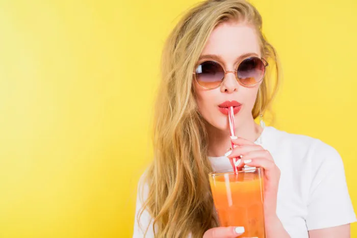 girl drinking crystal light