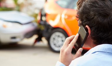 person reporting car accident to insurance
