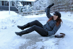 Slipping and falling on ice ends in injury.