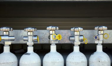 Five compressed gas cannisters