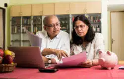 A couple looks over paperwork.