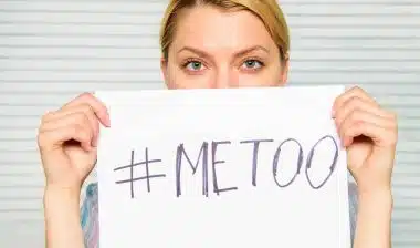 Woman holding #metoo sign