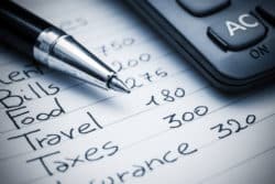 cost of living calculations written on paper regarding the class action lawsuit against Sun Life Assurance alleging they miscalculated the cost of living increase