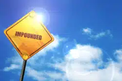 Impounded vehicle sign