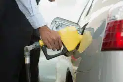 man pumping gas