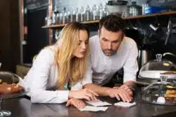 restaurant assistant manager working with wait staff