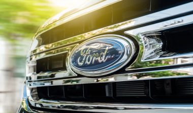 close up of Ford logo on grill of truck