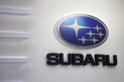 Subaru logo on white wall
