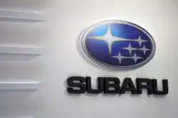 Subaru logo on white wall