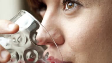 woman drinking ocean spray cranberry juice