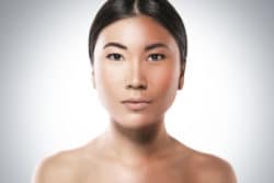 woman with two skin tones regarding unauthorized skin lightening products being seized