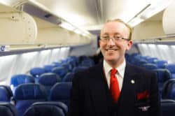 Delta airlines crew member in Lands' End uniform