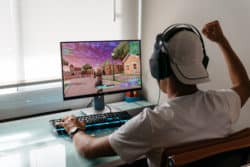 Kid playing Fortnite on computer