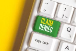 disability claim denial button on keyboard