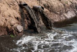industrial waste being dumped into lake