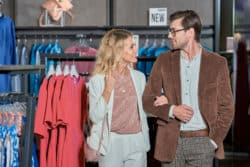 Couple shops in retail clothing store