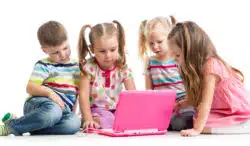 kids looking at laptop