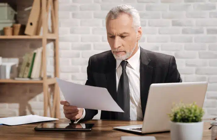 older employee applying for a job at PriceWaterhouseCoopers
