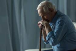 Old man looking sad