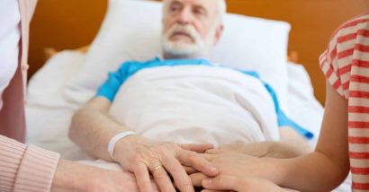 senior man in hospital bed