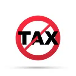 a stop tax sign regarding Alberta Justice Minister demanding Ottawa stop collecting carbon tax after Appeal Court ruled it violated the constitution