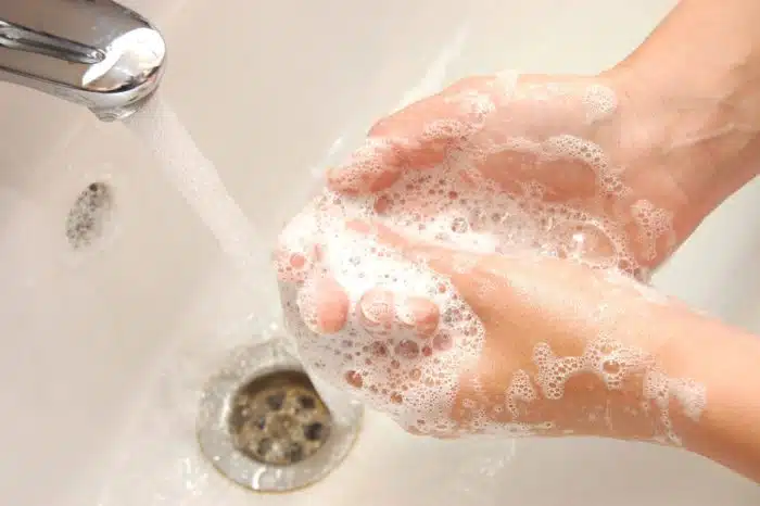 woman washing hands during the coronavirus outbreak