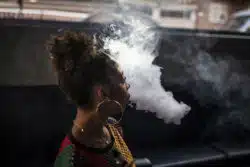 Woman vapes
