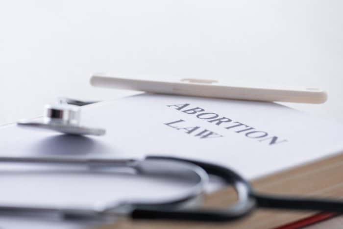 The abortion ban lawsuits references decades of abortion law supporting women's rights.