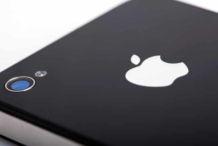 apple logo on the back of an iphone
